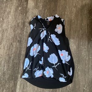 Worthington Size small black top with blue, white and orange flowers
